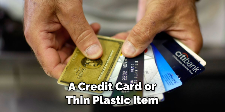 A Credit Card or Thin Plastic Item