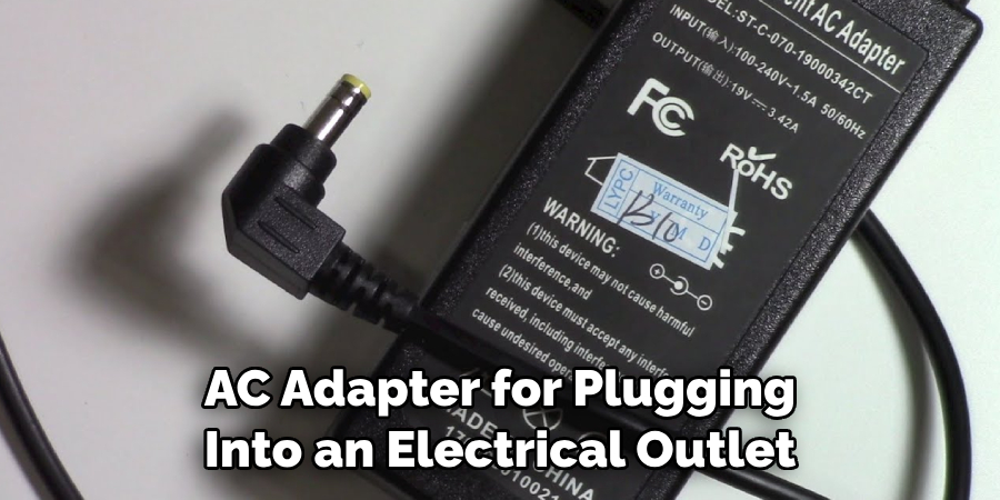 AC Adapter for Plugging Into an Electrical Outlet
