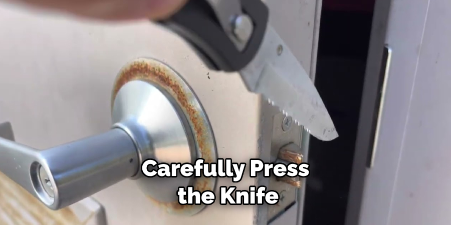 Carefully Press the Knife