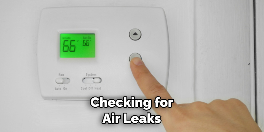 Checking for Air Leaks Around the Thermostat