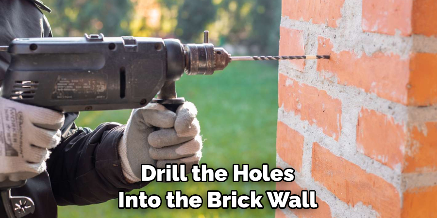 Drill the Holes Into the Brick Wall