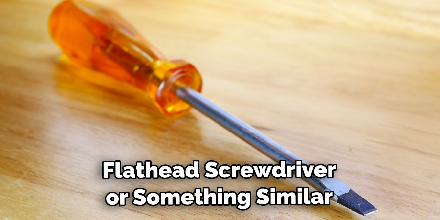 Flathead Screwdriver or Something Similar