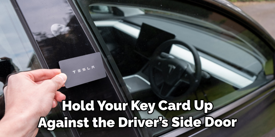 Hold Your Key Card Up Against the Driver’s Side Door