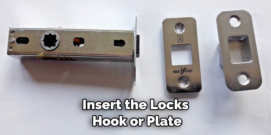 Insert the Locks Hook or Plate