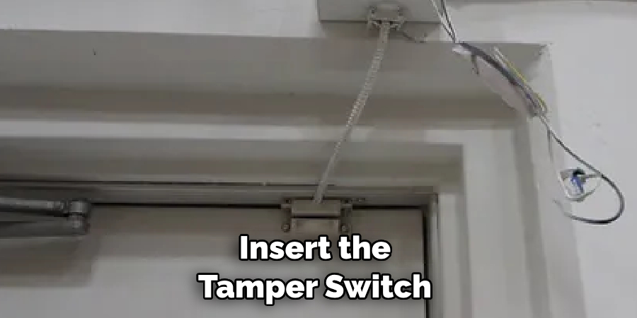 Insert the Tamper Switch 