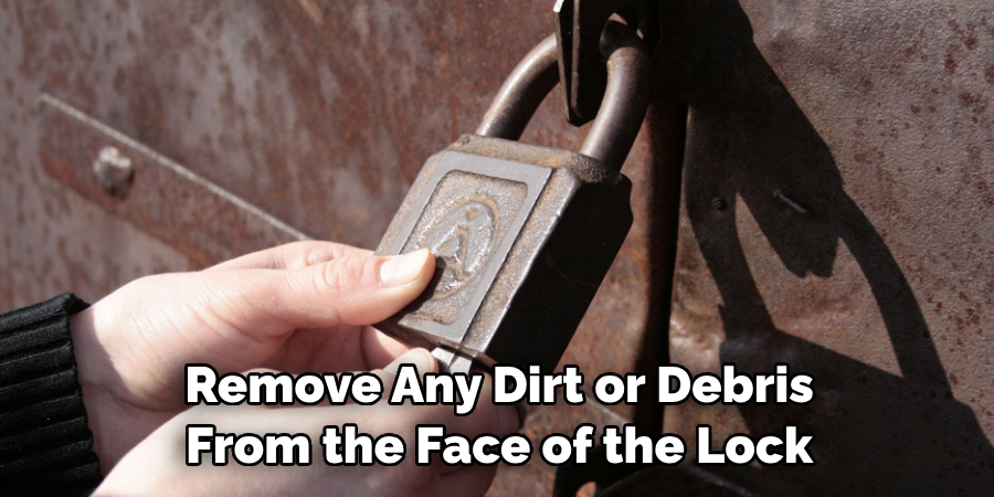  Remove Any Dirt or Debris From the Face of the Lock