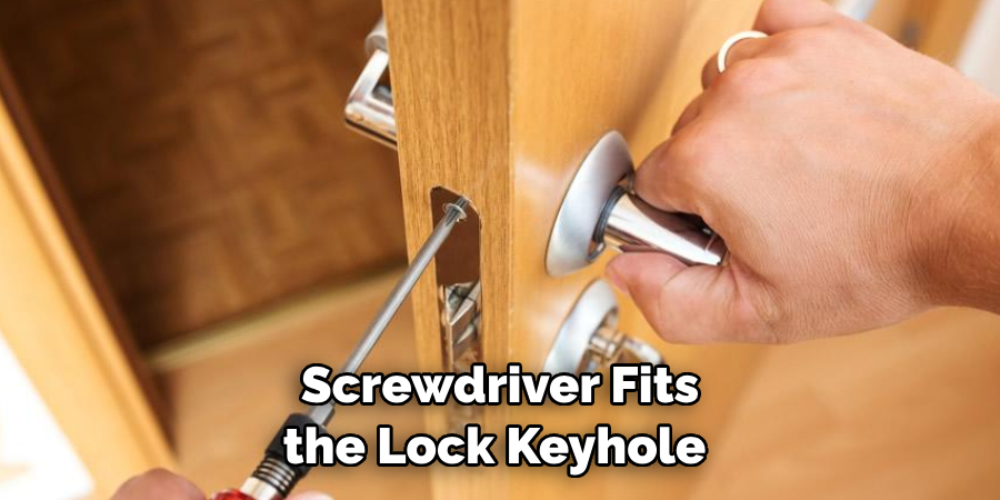 Screwdriver Fits the Lock Keyhole