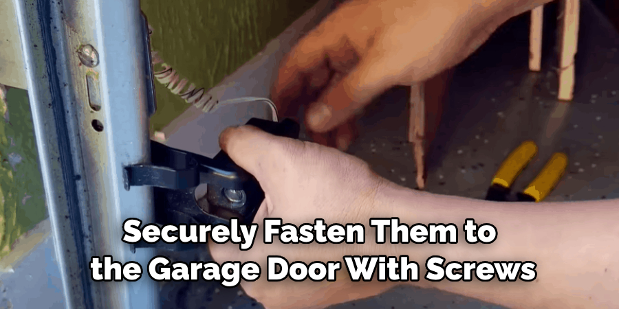 Securely Fasten Them to the Garage Door With Screws