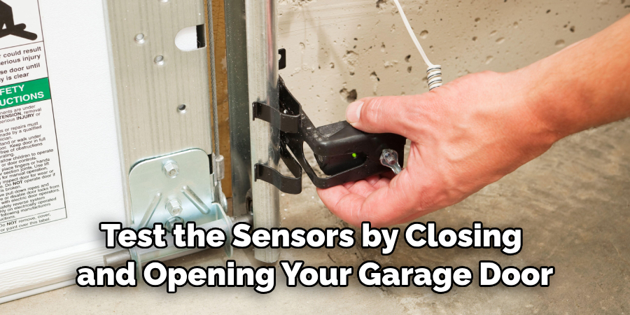Test the Sensors by Closing and Opening Your Garage Door