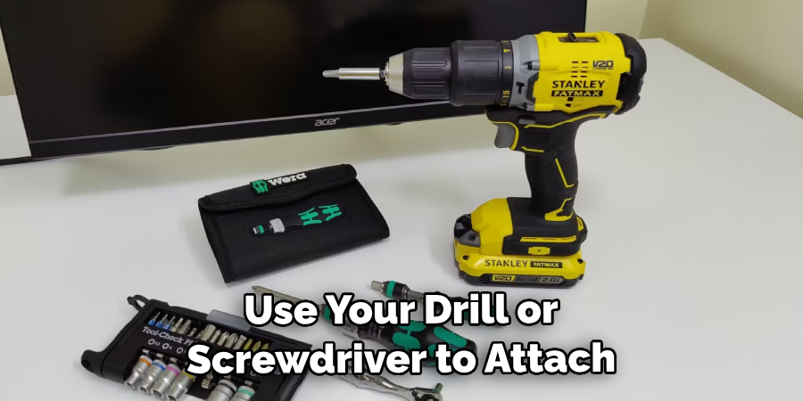 Use Your Drill or Screwdriver to Attach the Screws