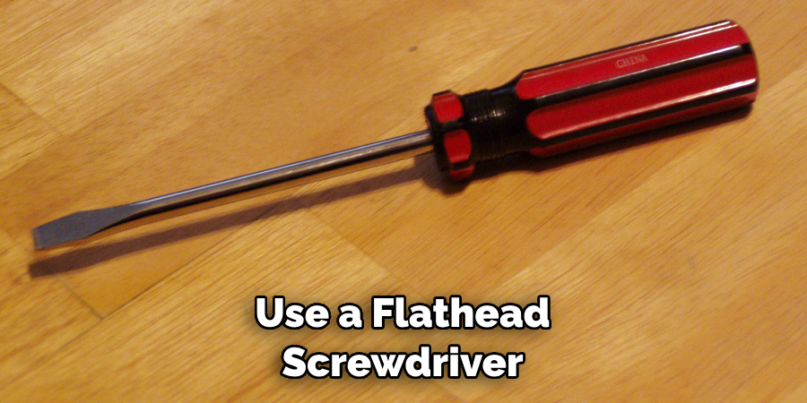 Use a Flathead Screwdriver