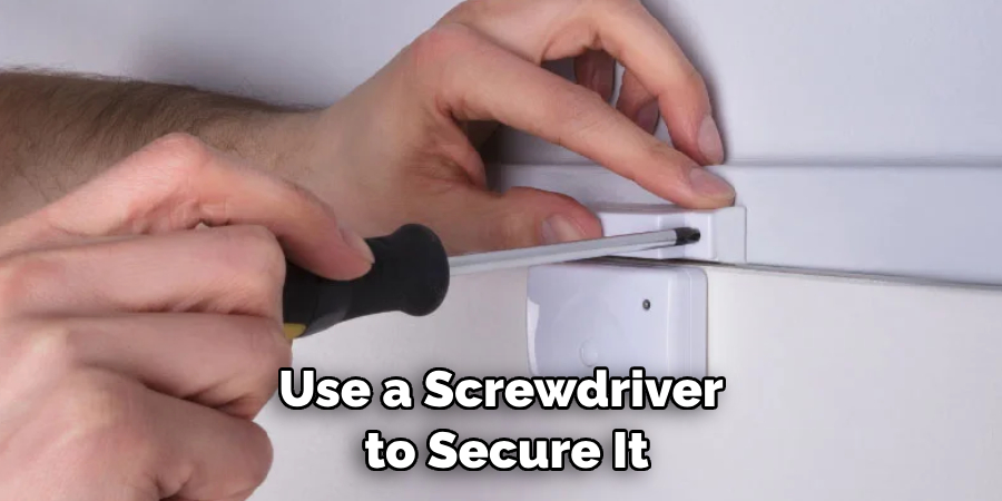 Use a Screwdriver to Secure It