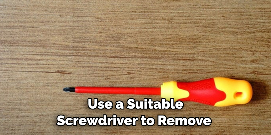  Use a Suitable Screwdriver to Remove 
