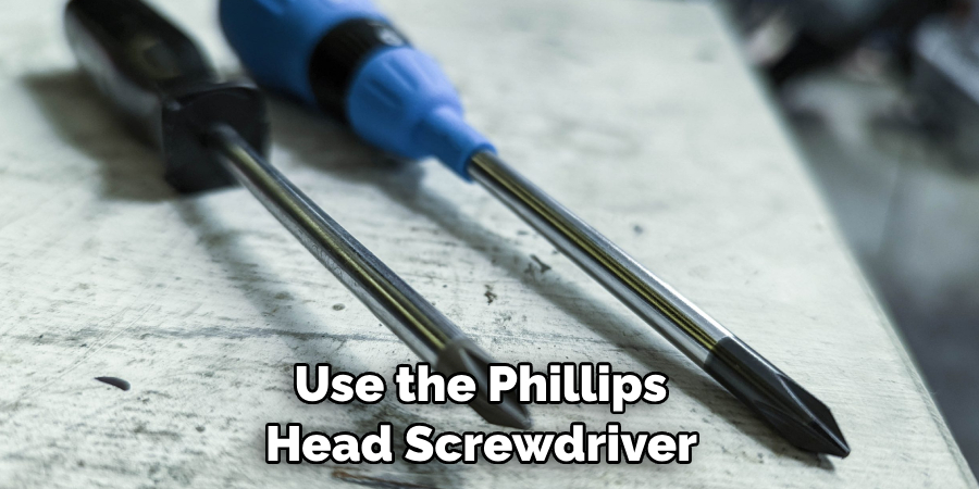 Use the Phillips Head Screwdriver 