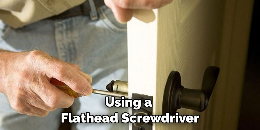 Using a Flathead Screwdriver