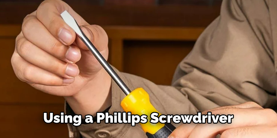 Using a Phillips Screwdriver