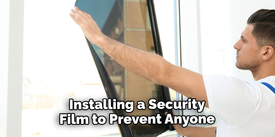 Installing a Security Film to Prevent Anyone