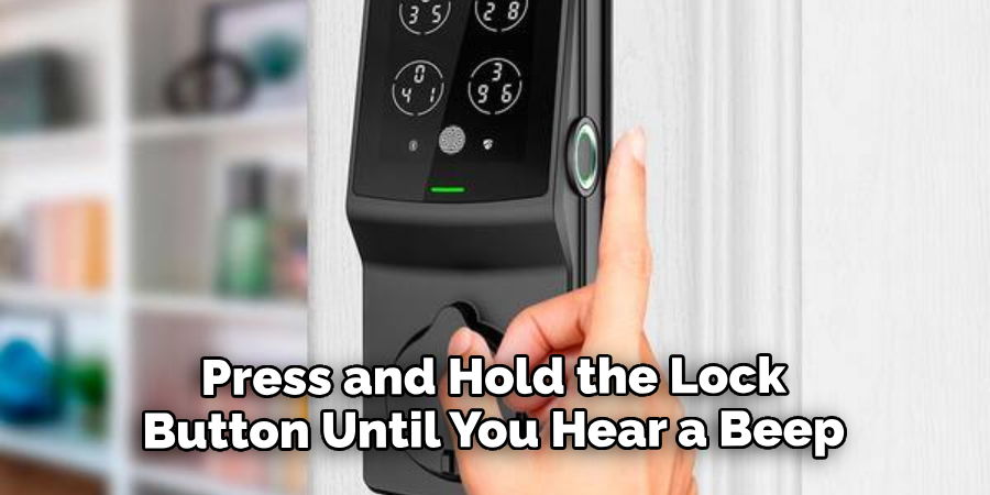 Press and Hold the Lock Button Until You Hear a Beep Sound