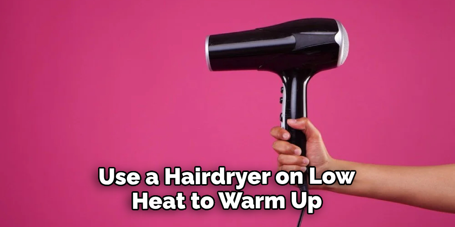 Use a Hairdryer on Low Heat to Warm Up