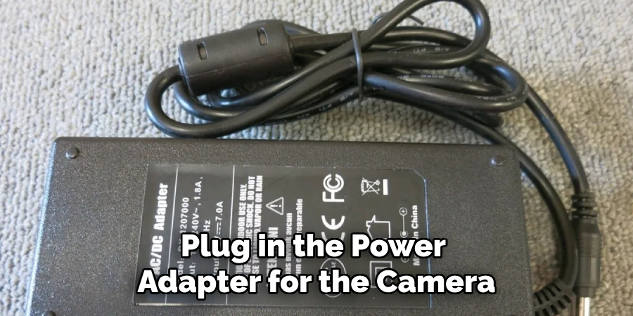 Plug in the Power Adapter for the Camera