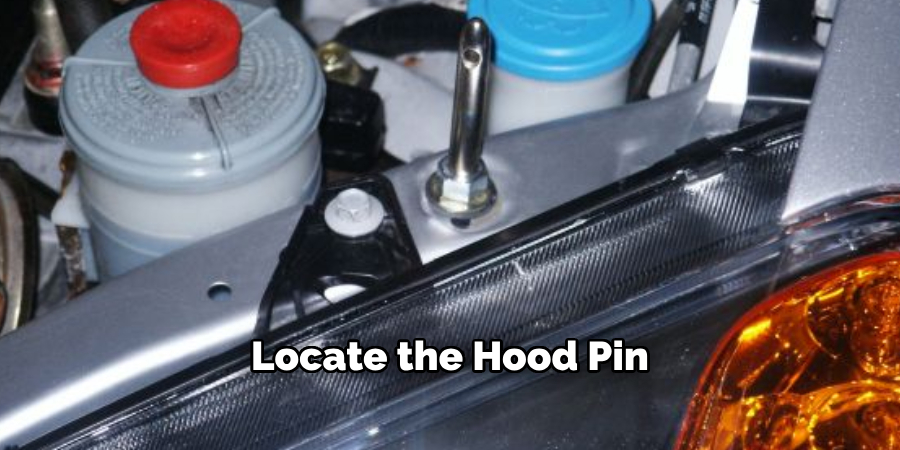 Locate the Hood Pin