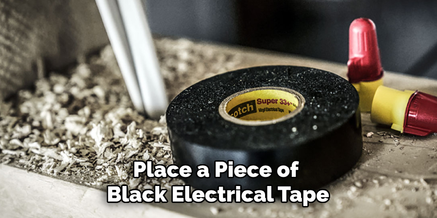 Place a Piece of Black Electrical Tape