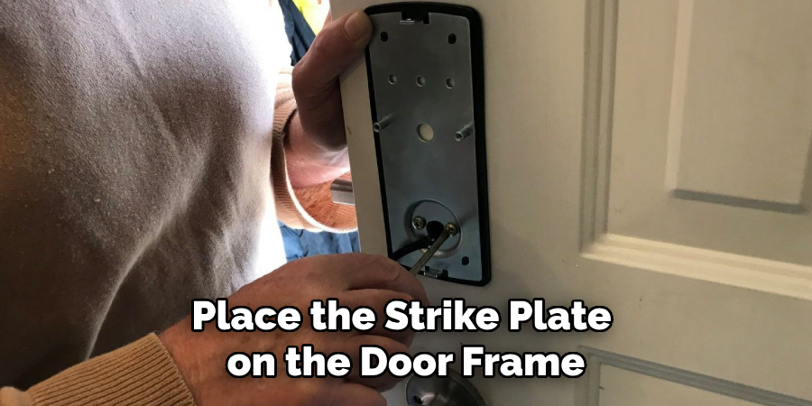 Place the Strike Plate on the Door Frame