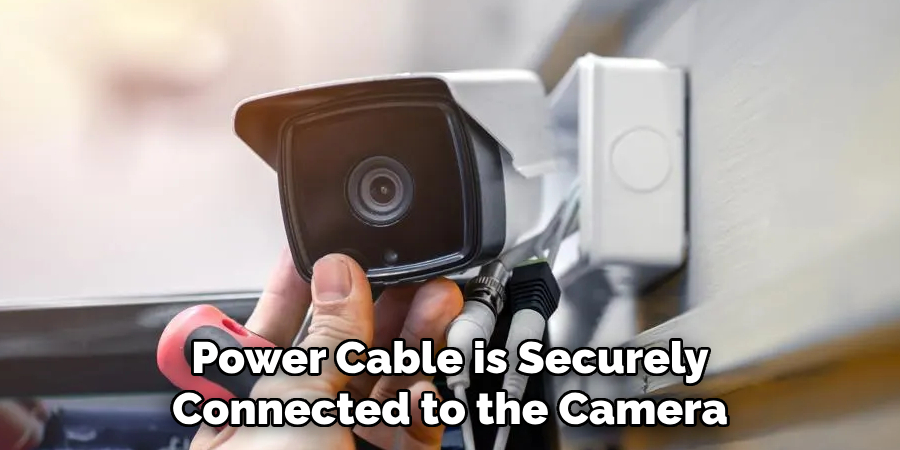 power cable is securely connected to the camera