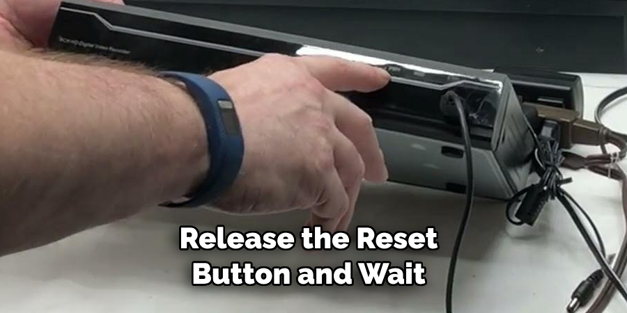 Release the Reset Button and Wait