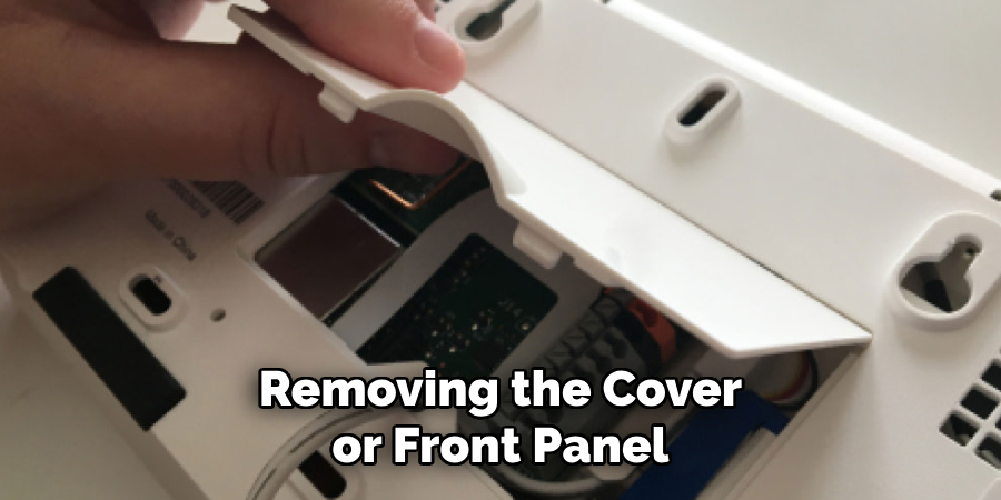 Removing the Cover or Front Panel