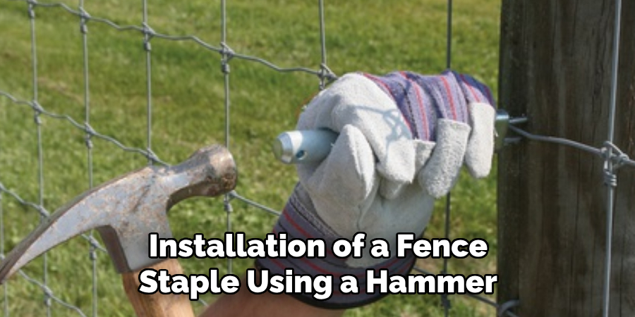 Installation of a Fence Staple Using a Hammer