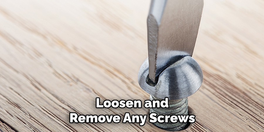 Loosen and Remove Any Screws