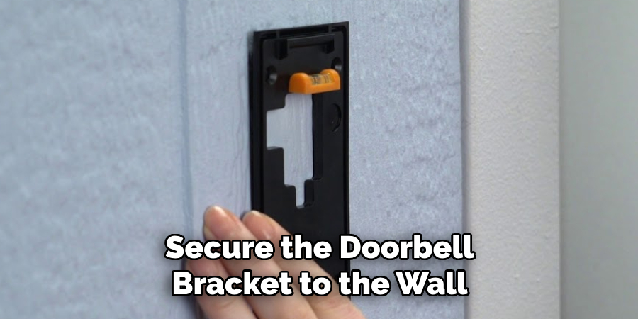 Secure the Doorbell Bracket to the Wall