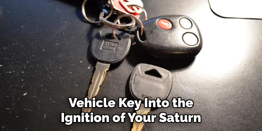 Vehicle Key Into the Ignition of Your Saturn