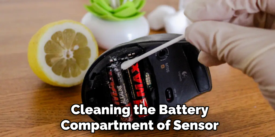 Cleaning the Battery
Compartment of Sensor