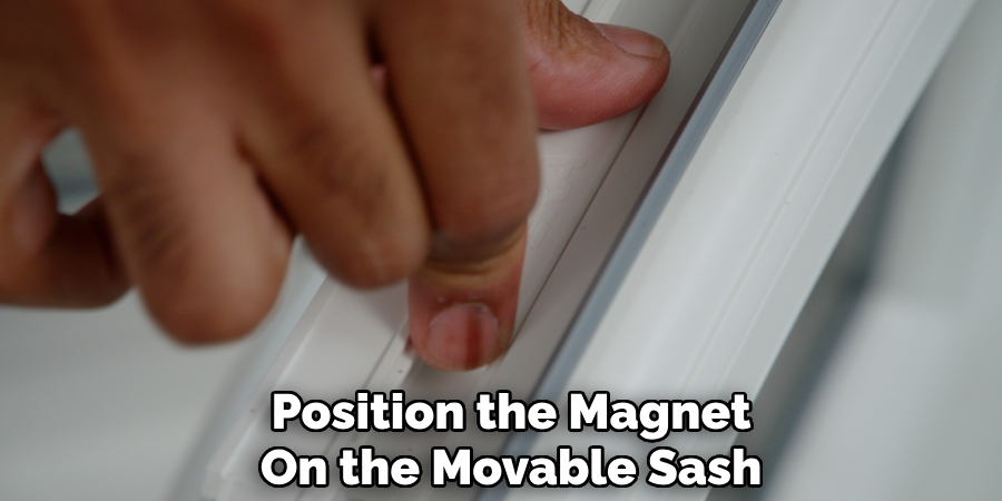 Position the Magnet On the Movable Sash
