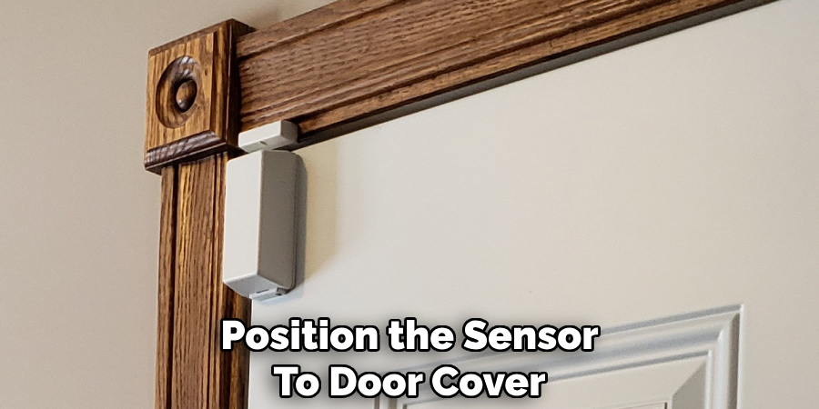 Position the Sensor
To Door Cover