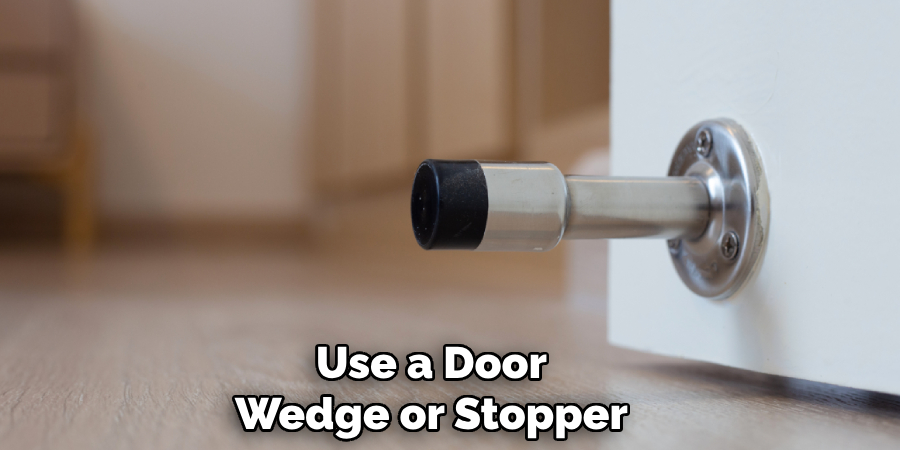 Use a Door Wedge or Stopper