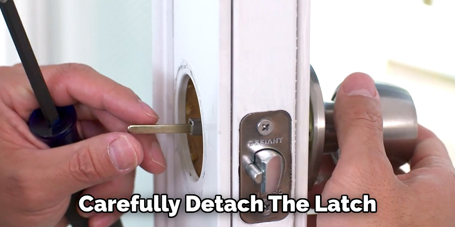 Carefully Detach the Latch