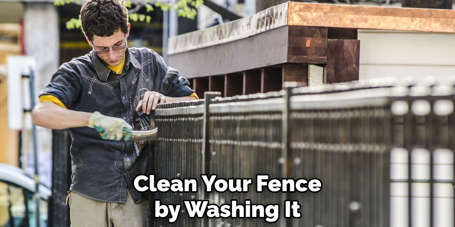 Clean Your Fence by Washing It
