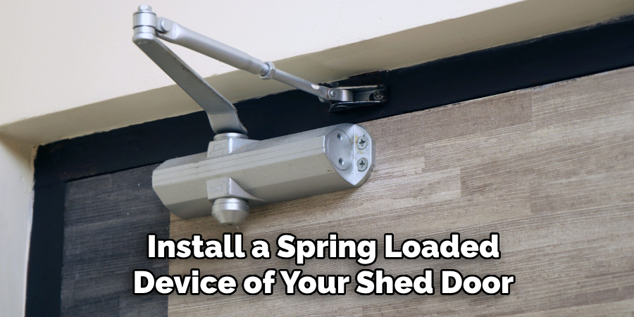 Install a Spring Loaded
Device of Your Shed Door