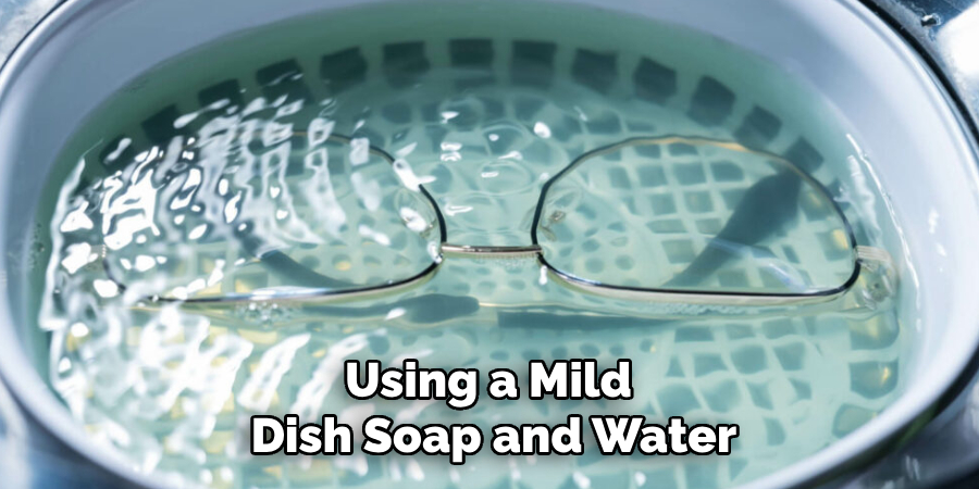 Using a Mild 
Dish Soap and Water