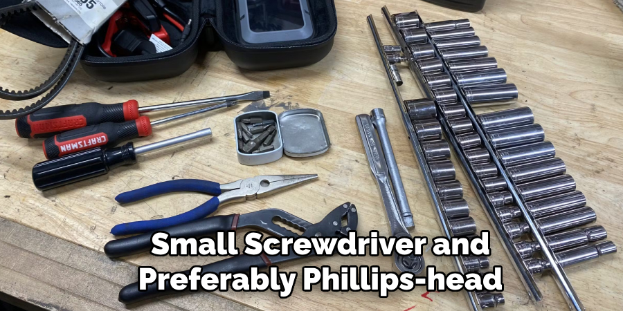 Small Screwdriver and Preferably a Phillips-head