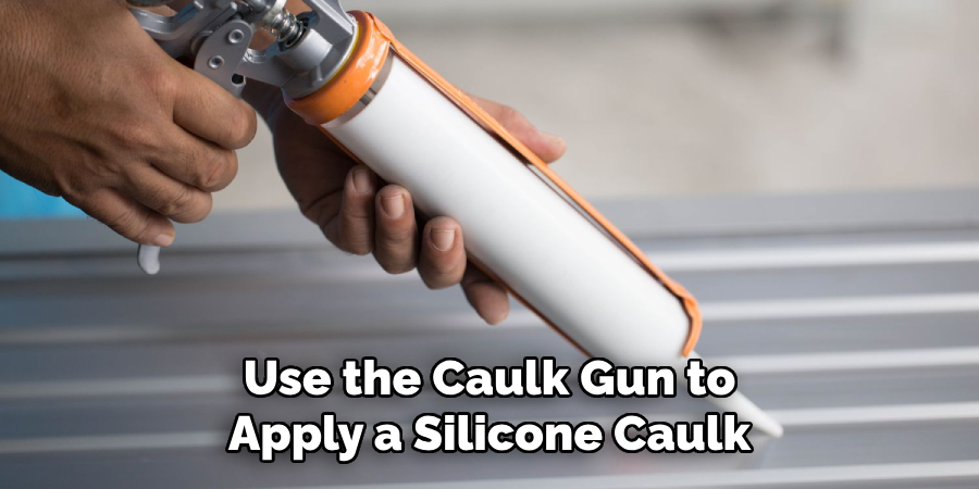 Use the Caulk Gun to
Apply a Silicone Caulk