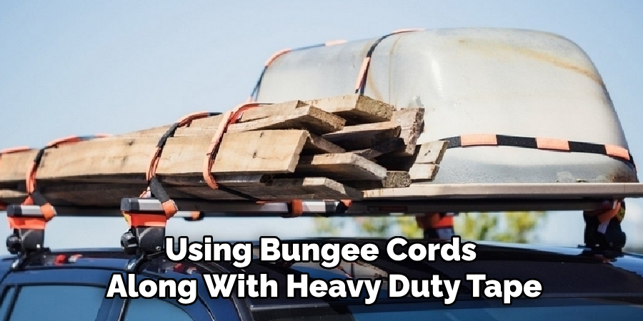 Using Bungee Cords 
Along With Heavy Duty Tape