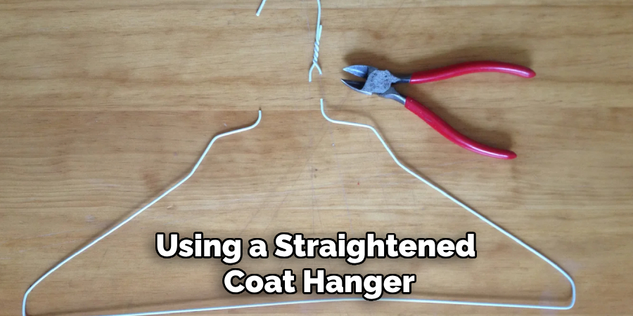 Using a Straightened 
Coat Hanger