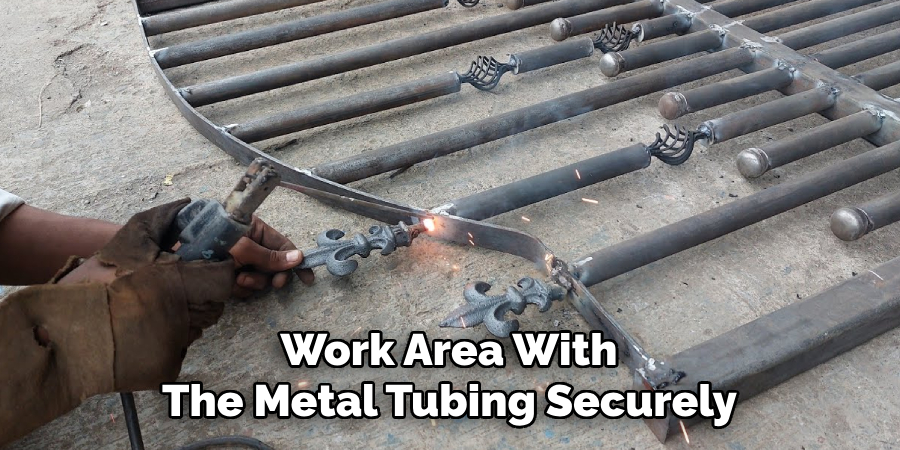 Work Area With 
The Metal Tubing Securely 