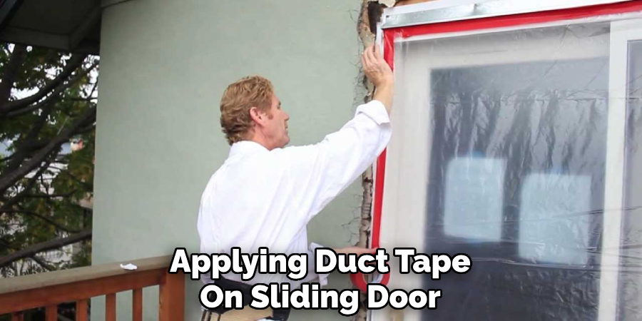 Applying Duct Tape
On Sliding Door