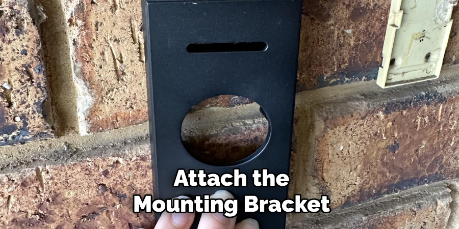 Attach the
Mounting Bracket