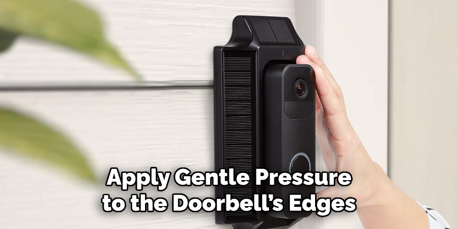 Apply Gentle Pressure to the Doorbell’s Edges